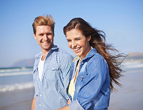 Couple taking a romantic beach walk